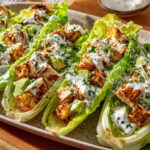 Salades en barquettes de romaine au poulet miel-citron vert et avocat